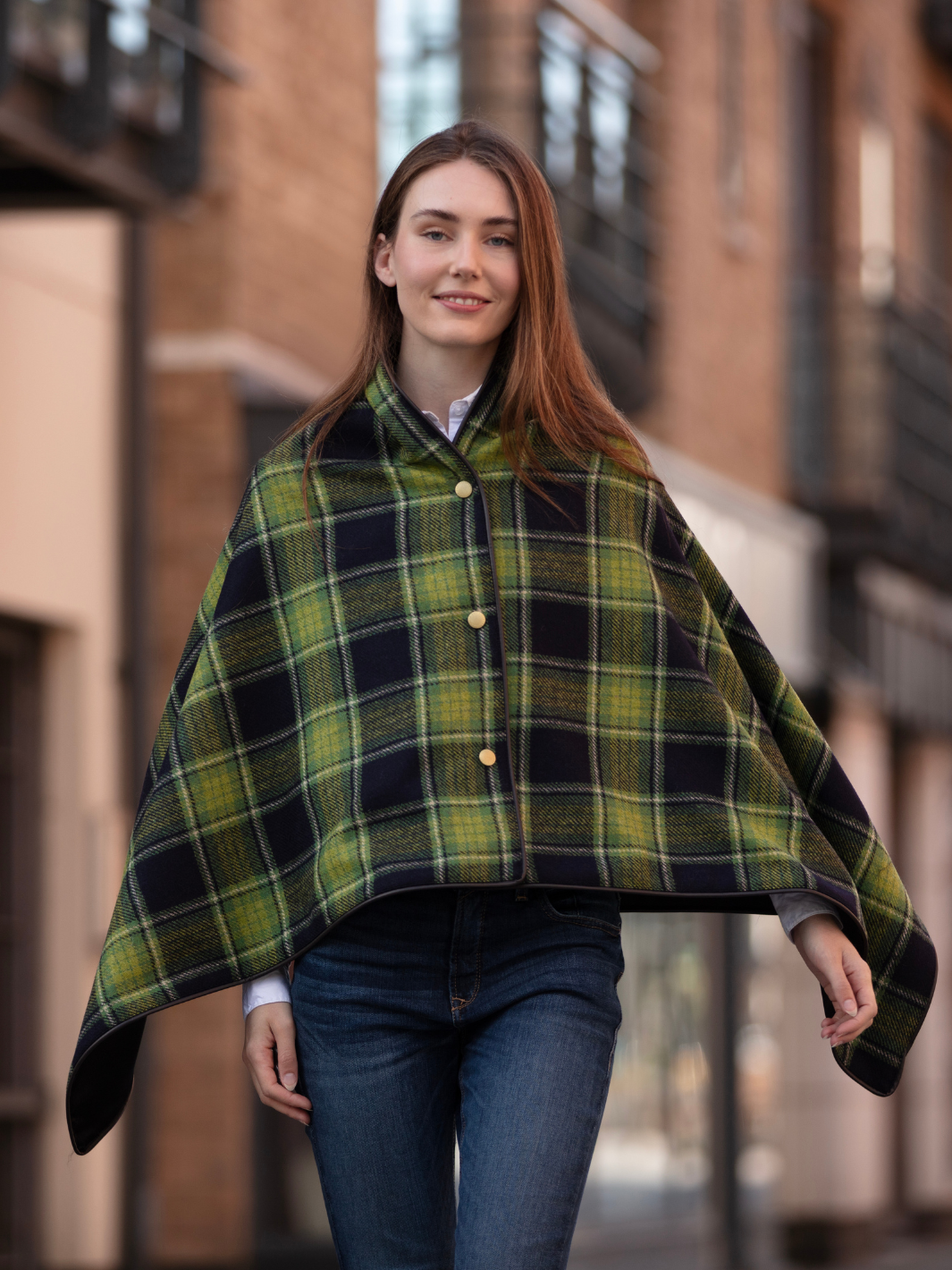 Green and black tartan tweed shawl with black satin lining, gold studs, and faux leather trim, handcrafted in the UK by John Partridge.
