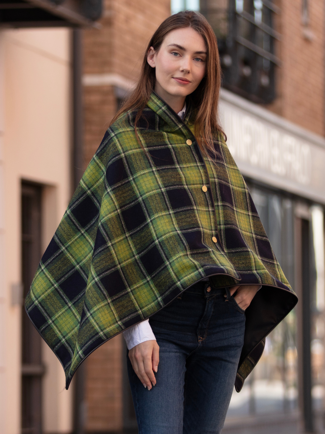 Green and black tartan tweed shawl with black satin lining, gold studs, and faux leather trim, handcrafted in the UK by John Partridge.