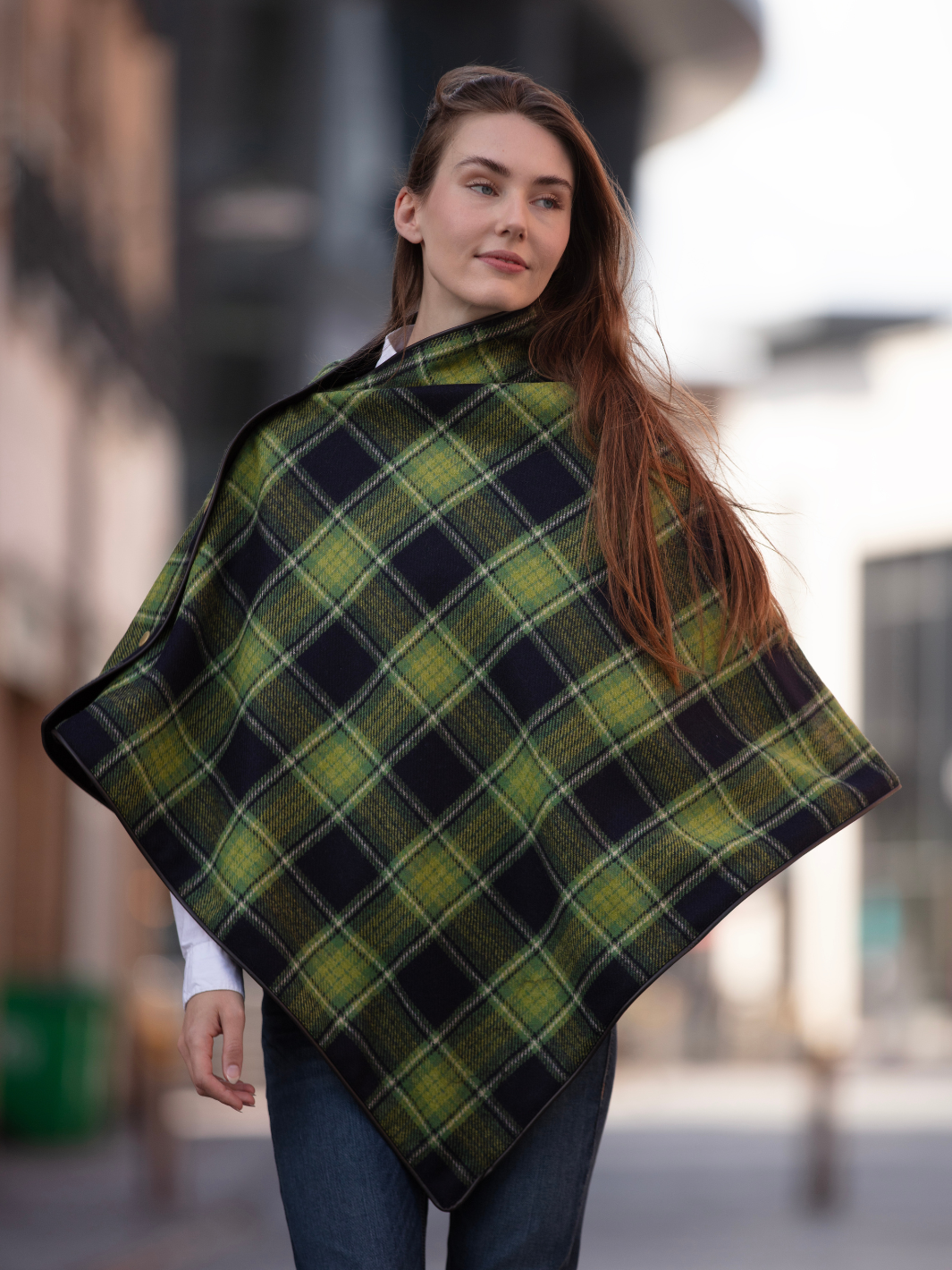 Green and black tartan tweed shawl with black satin lining, gold studs, and faux leather trim, handcrafted in the UK by John Partridge.