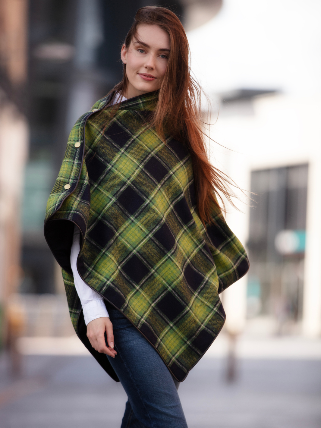 Green and black tartan tweed shawl with black satin lining, gold studs, and faux leather trim, handcrafted in the UK by John Partridge.