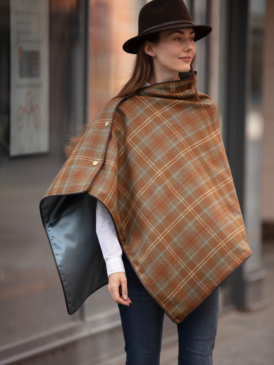 Brown, blue and cream tartan tweed shawl with black satin lining, gold studs, and faux leather trim, handcrafted in the UK by John Partridge