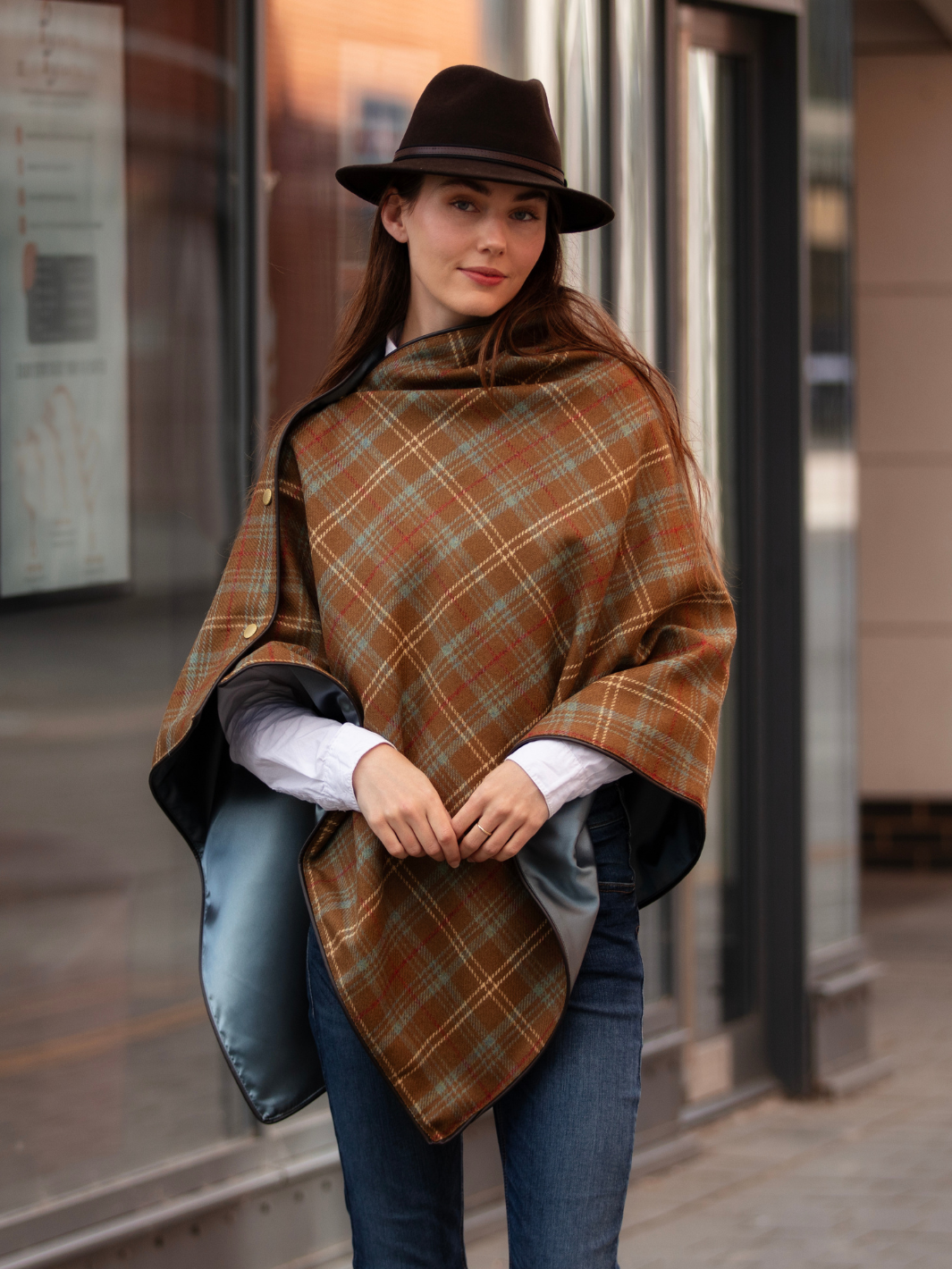 Brown, blue and cream tartan tweed shawl with black satin lining, gold studs, and faux leather trim, handcrafted in the UK by John Partridge