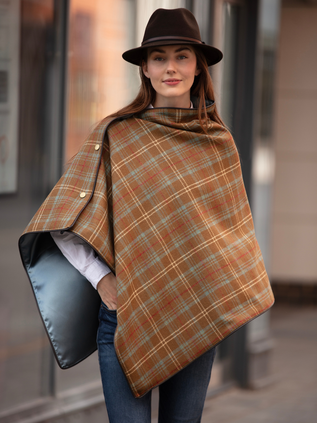 Brown, blue and cream tartan tweed shawl with black satin lining, gold studs, and faux leather trim, handcrafted in the UK by John Partridge