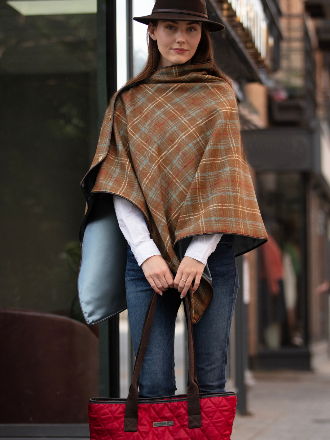 Brown, blue and cream tartan tweed shawl with black satin lining, gold studs, and faux leather trim, handcrafted in the UK by John Partridge