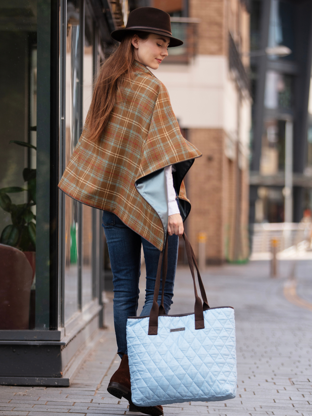 Brown, blue and cream tartan tweed shawl with black satin lining, gold studs, and faux leather trim, handcrafted in the UK by John Partridge