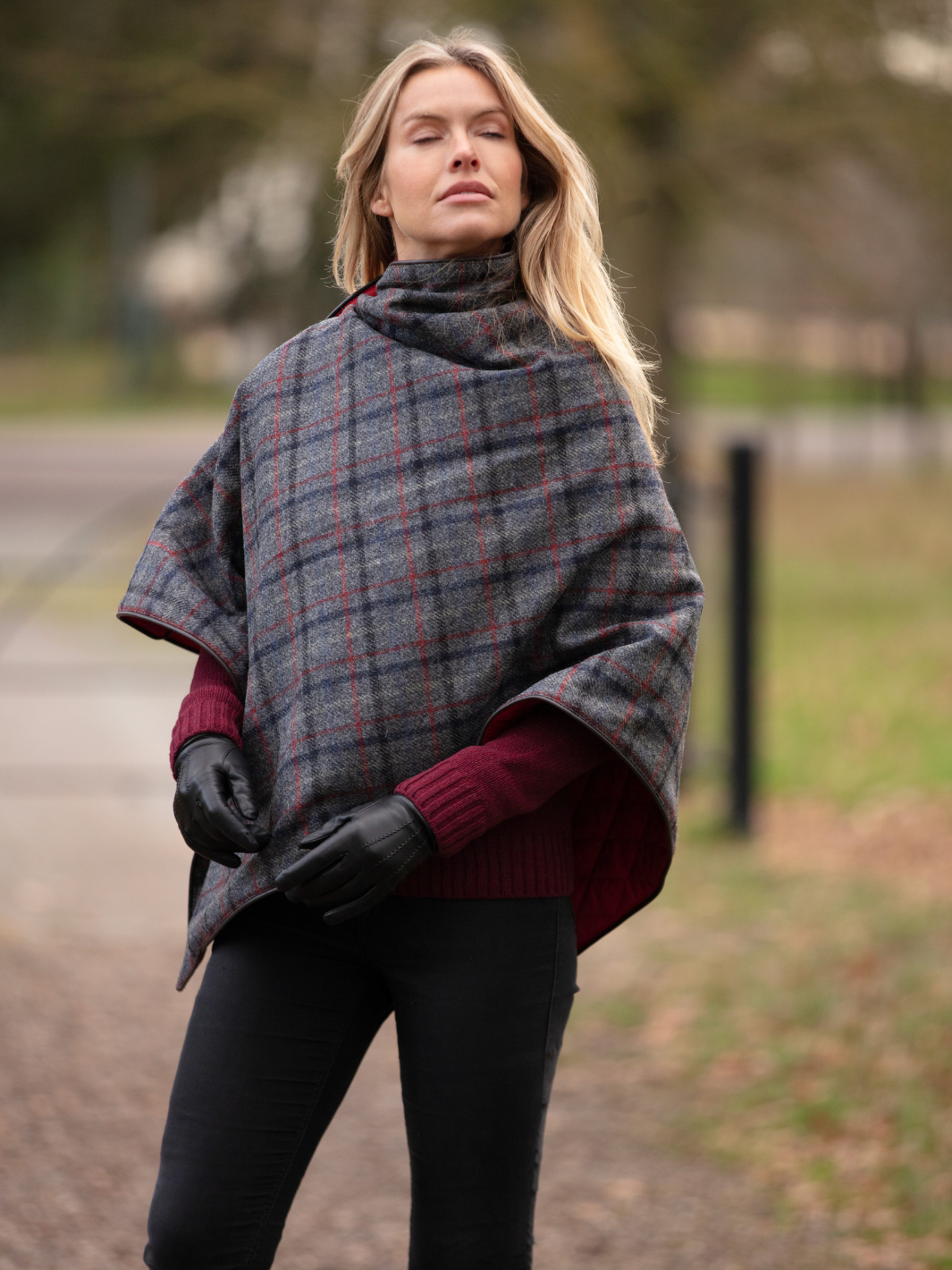 Made in England Tweed Shawl | Women’s heritage tweed cape with dark grey multi-check pattern, red quilted lining and gold fastenings
