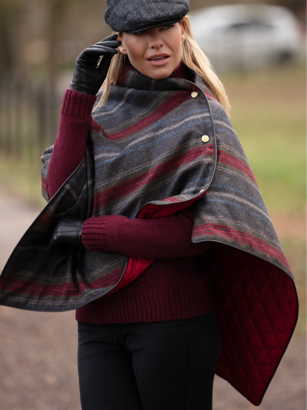 Made in England Tweed Shawl | Dark grey wool wrap with red, blue and light grey stripes, red quilted lining, brown trim and gold studs