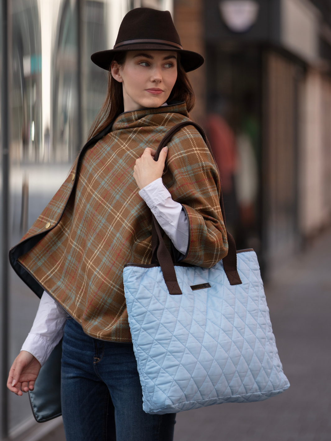 John Partridge & Co. Oversized Tote Bag in baby blue with herringbone straps, leather-look binding, antique brass plate, and spacious interior, expertly crafted in England.