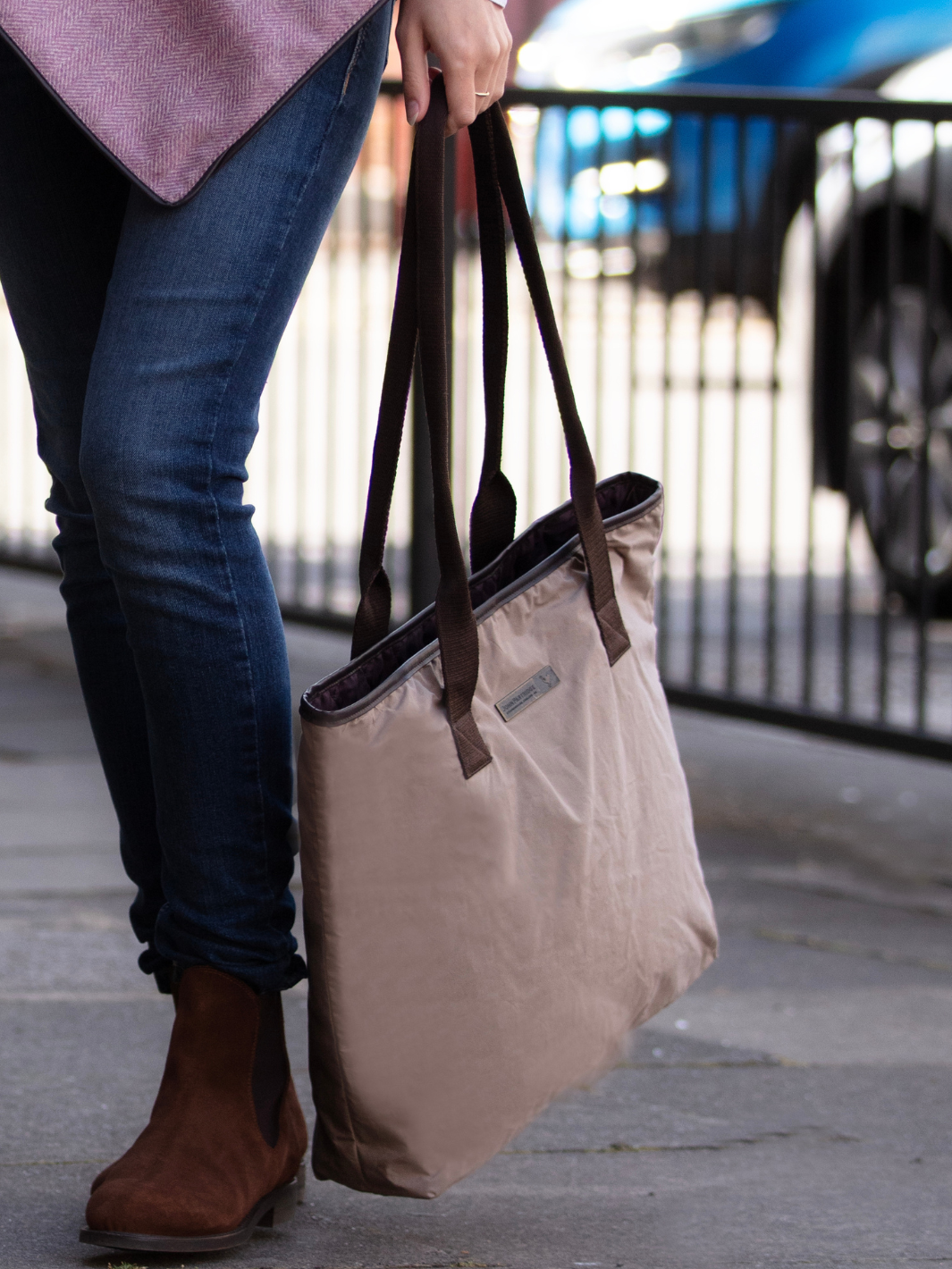 John Partridge & Co. Oversized Tote Bag in grey with herringbone straps, leather-look binding, antique brass plate, and spacious interior, expertly crafted in England.