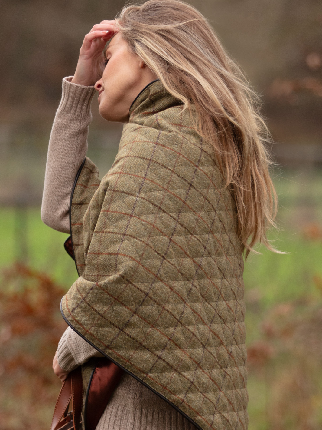 Made in England Quilted Tweed Shawl | British women’s layering wrap in green and brown checked wool with rust lining and gold fastenings