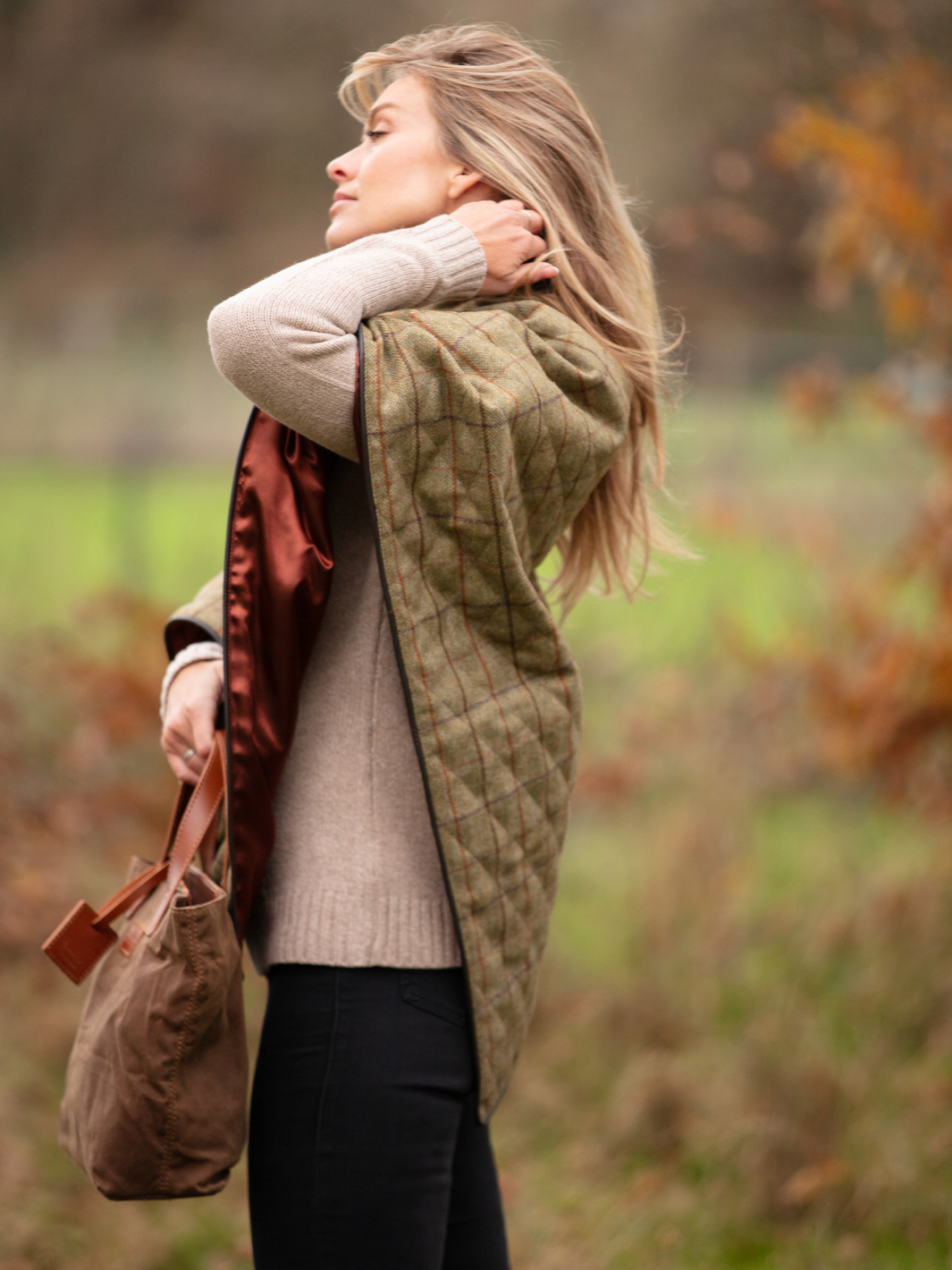 Made in England Quilted Tweed Shawl | Women’s wool shawl in green and brown check with rust satin lining, leather-look binding and gold stud closureWomen