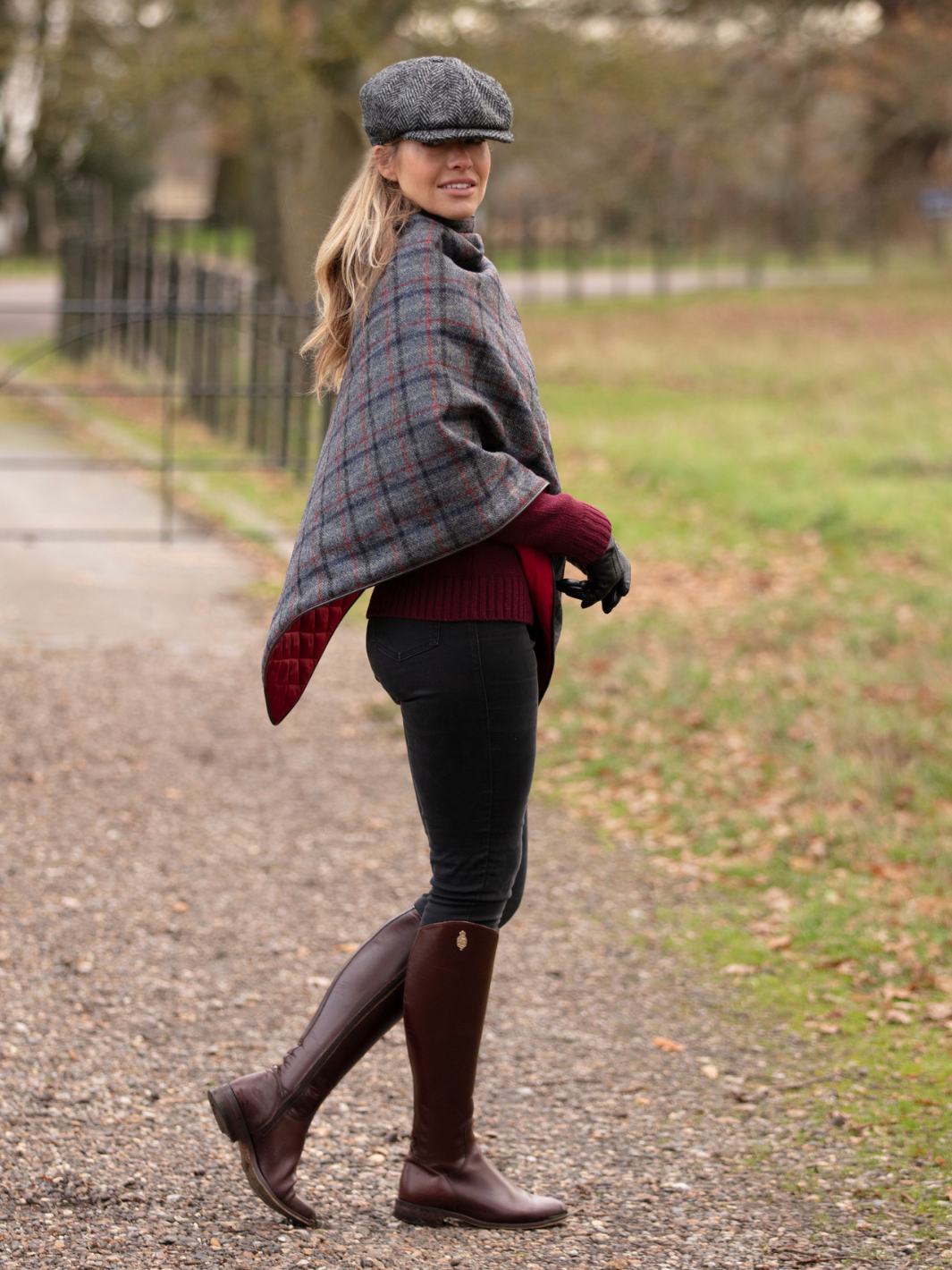 Made in England Tweed Shawl | Dark grey multi-check wool cape with red, black and navy pattern, contrast red lining and gold buttons