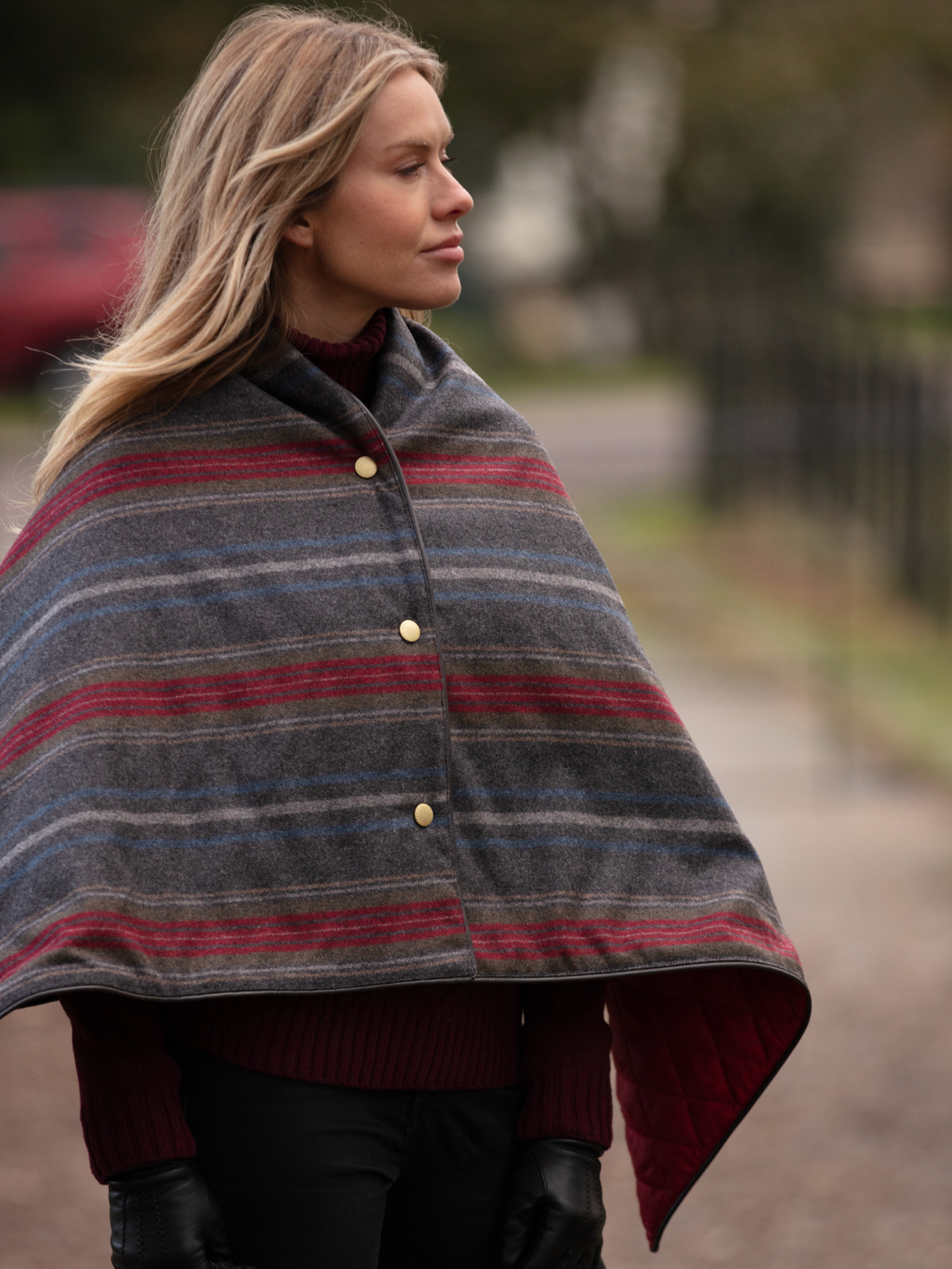 Made in England Tweed Shawl | Dark grey wool shawl with red, blue and light grey stripes, bright red quilted lining, dark brown trim and gold stud fastenings
