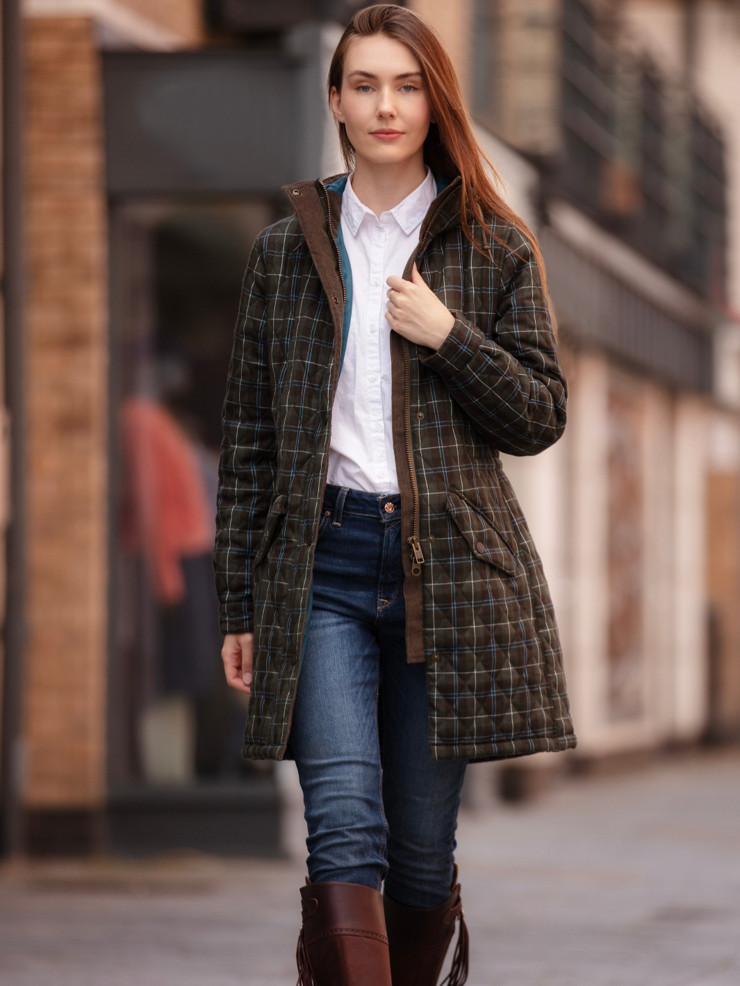 Newmarket Quilted Hooded Coat in Olive Check with adjustable waist and hood, olive corduroy trims, satin lining, 2-way zip, and practical pockets, crafted in Britain.
